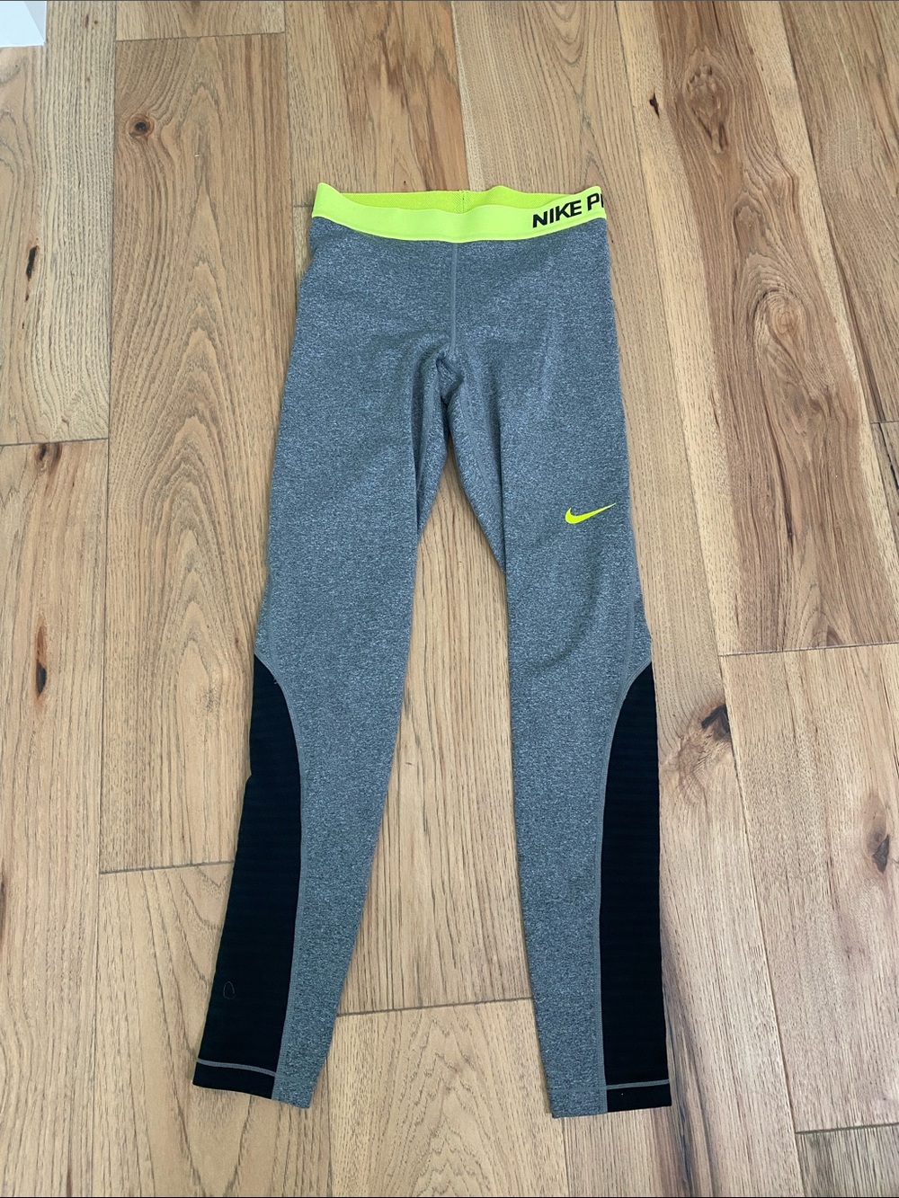Nike women s Grey Leggings with Neon Yellow Waistband & Logo. Great for the gym